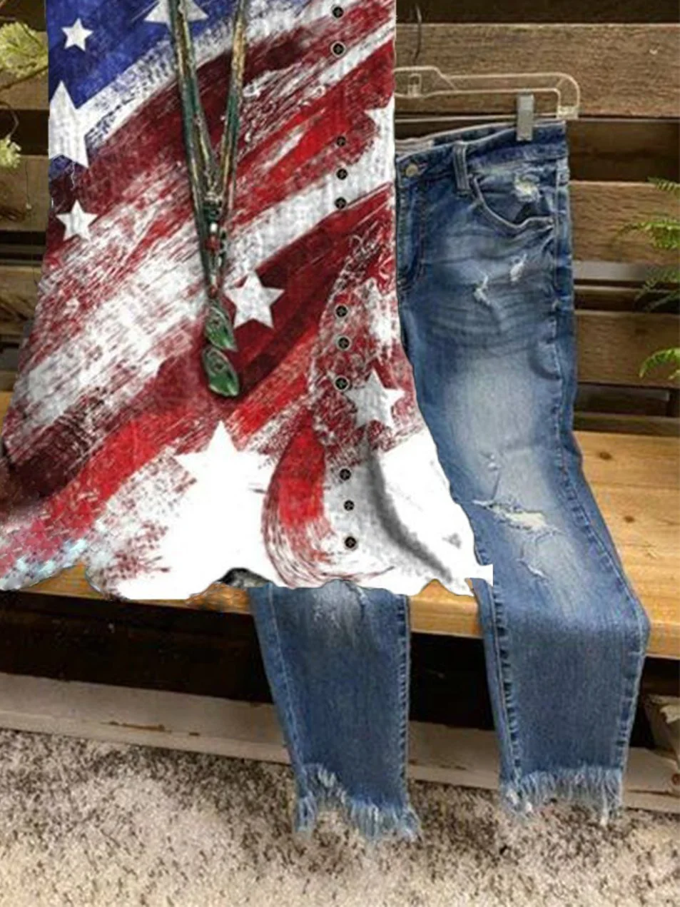 A sleeveless shirt with an American flag print
