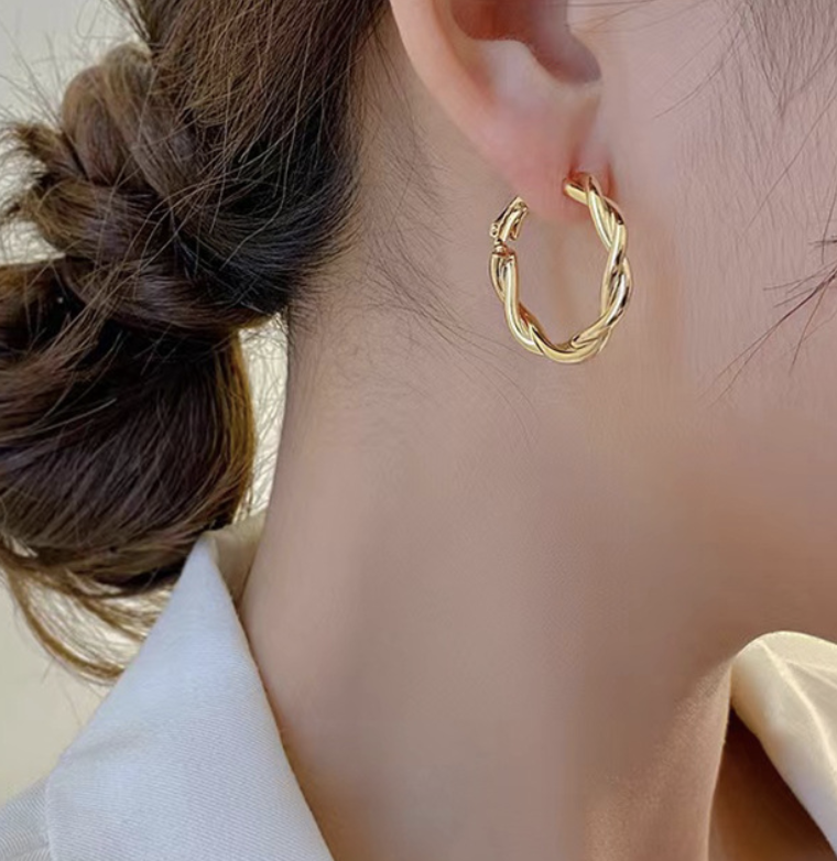 Twist design earrings